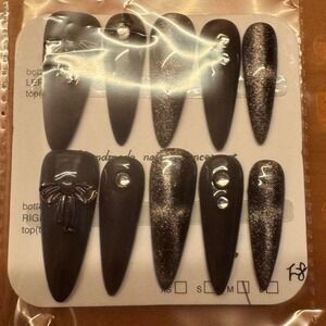 Black Sparkle Press-On Nails with Rhinestone & Bow Accent – Long Stiletto Shape